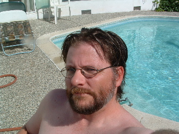 self-portrait by pool